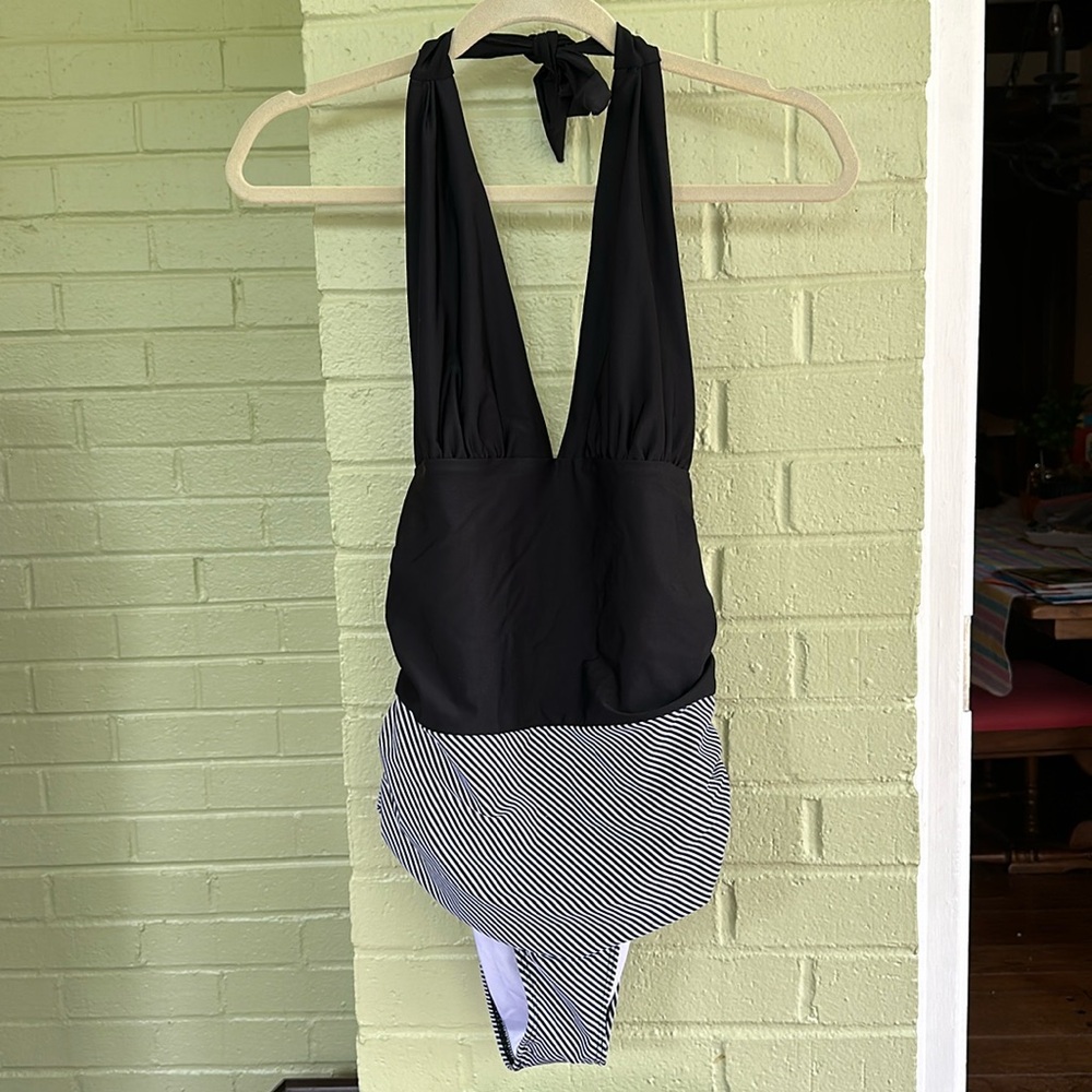 Swimsuit, one-piece black and white with light tummy control and gathered sides